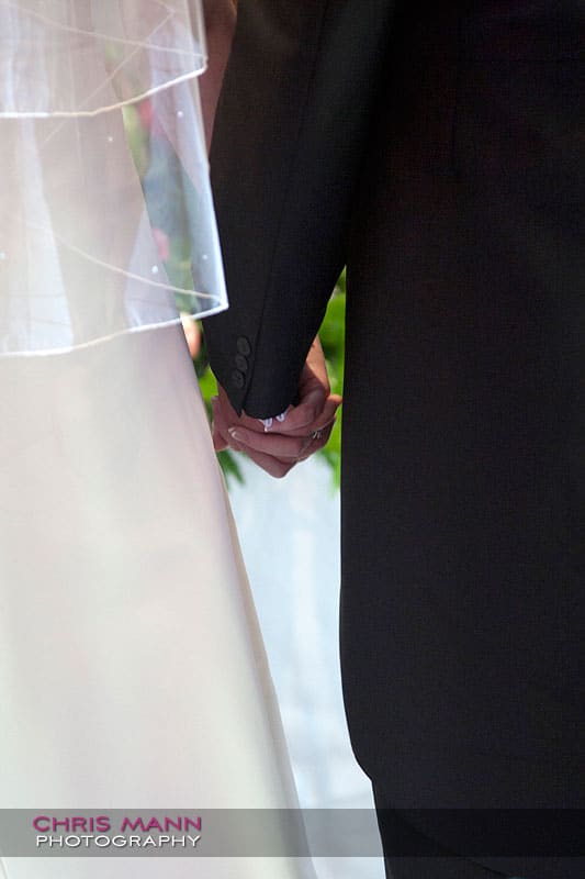 holding hands - Libby and Paul's wedding at Cisswood House - photo by Chris Mann Photography holding hands - Libby and Paul's wedding at Cisswood House - photo by Chris Mann Photography