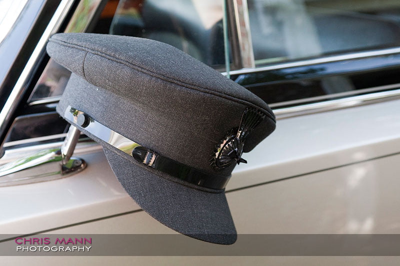 Kimberley & Richard at Bentley - chauffeur's cap on mirror Kimberley & Richard at Bentley - chauffeur's cap on mirror