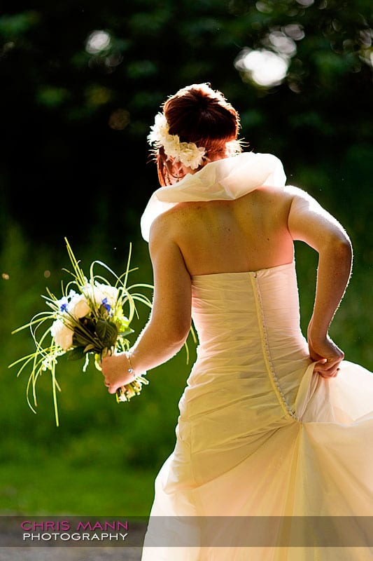 Kimberley & Richard at Bentley - bride backlit by sunshine Kimberley & Richard at Bentley - bride backlit by sunshine