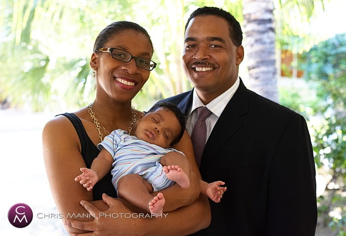 parents holding their baby in their arms - family photo shoot