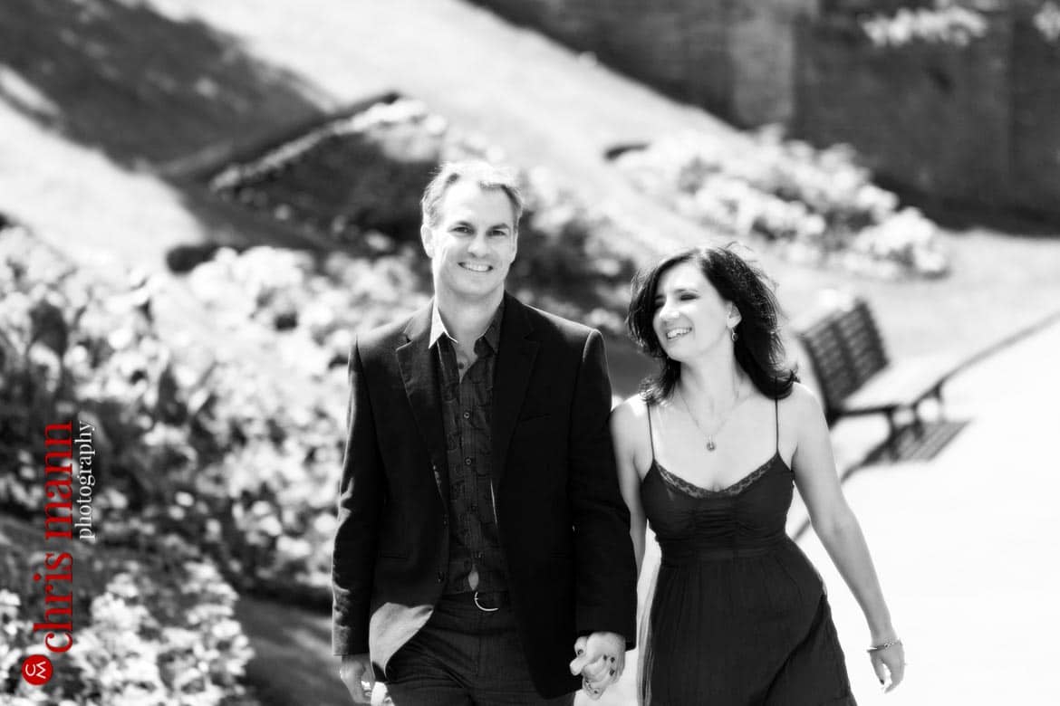 Engagement shoot Guildford Castle couple portrait walking in gardens