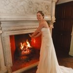 bride by fireplace Thonrton Manor
