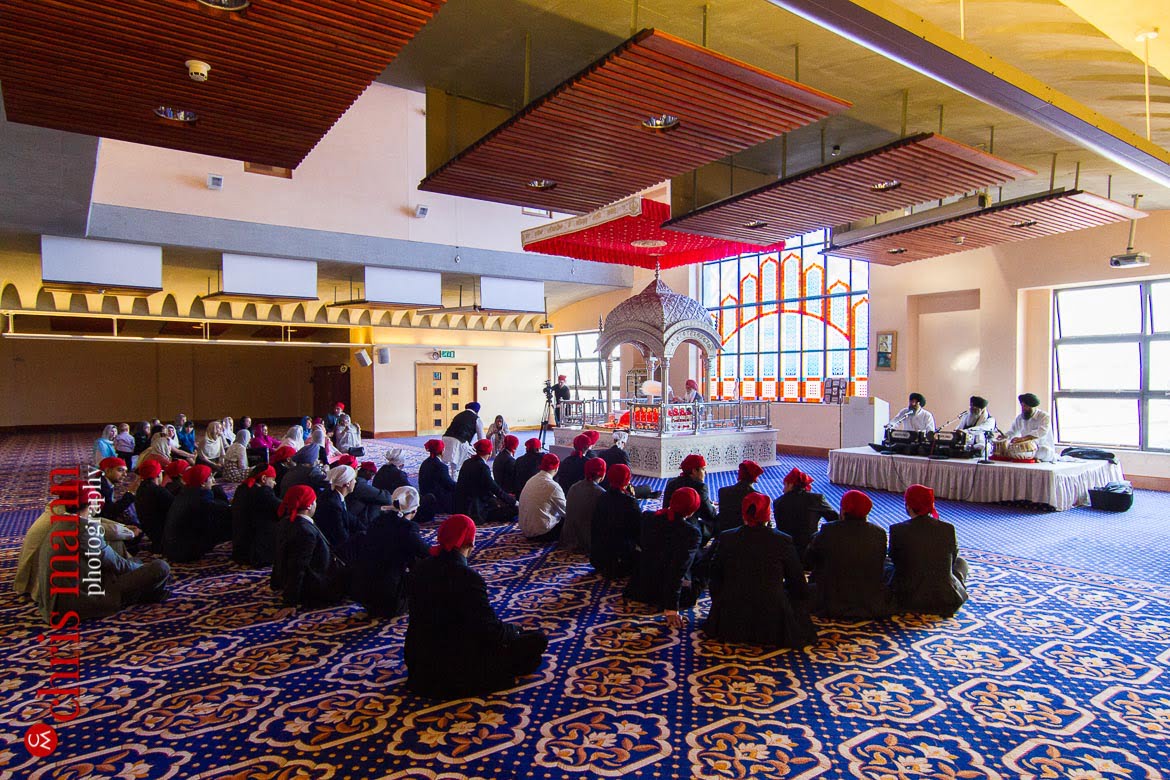 Sikh wedding families attend ceremony in Gurdwara