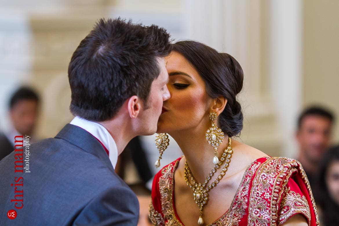 bride and groom kiss Syon Park civil ceremony