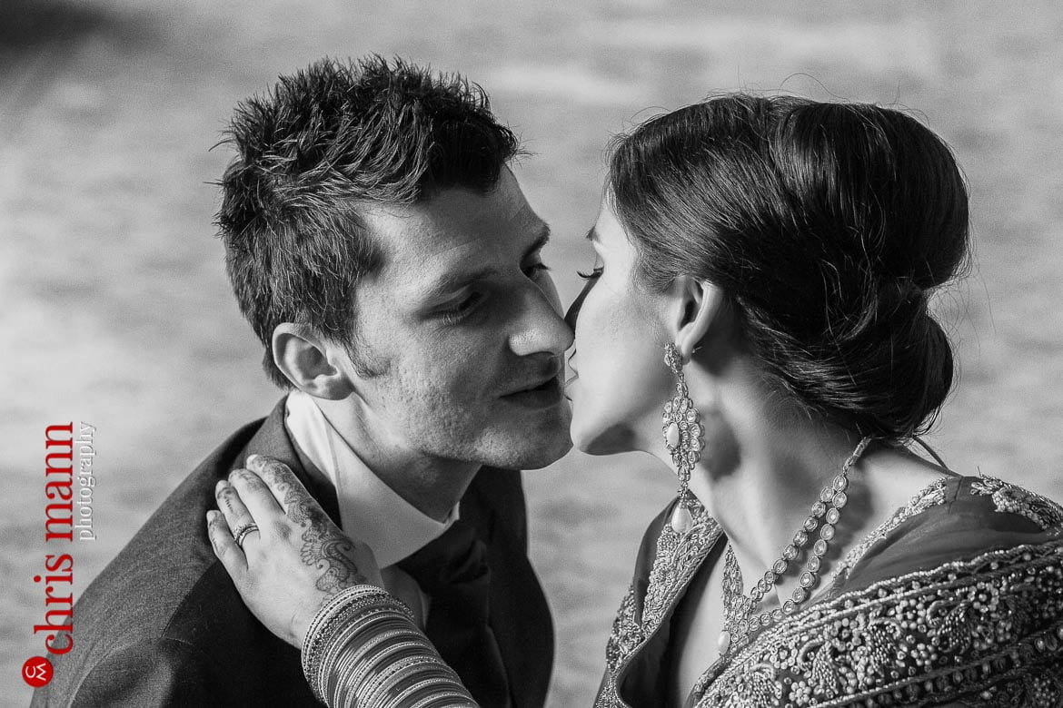 bride and groom kiss in library Syon House civil wedding