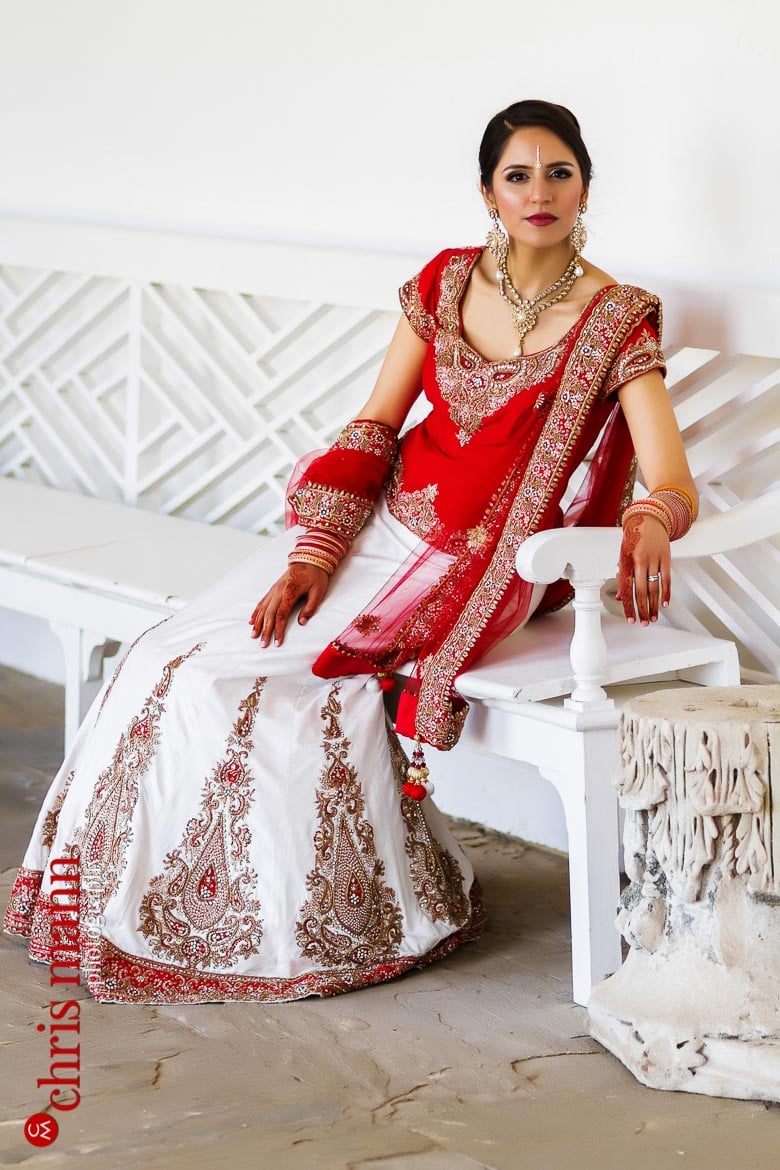 bride seated on bench at wedding Syon Park London