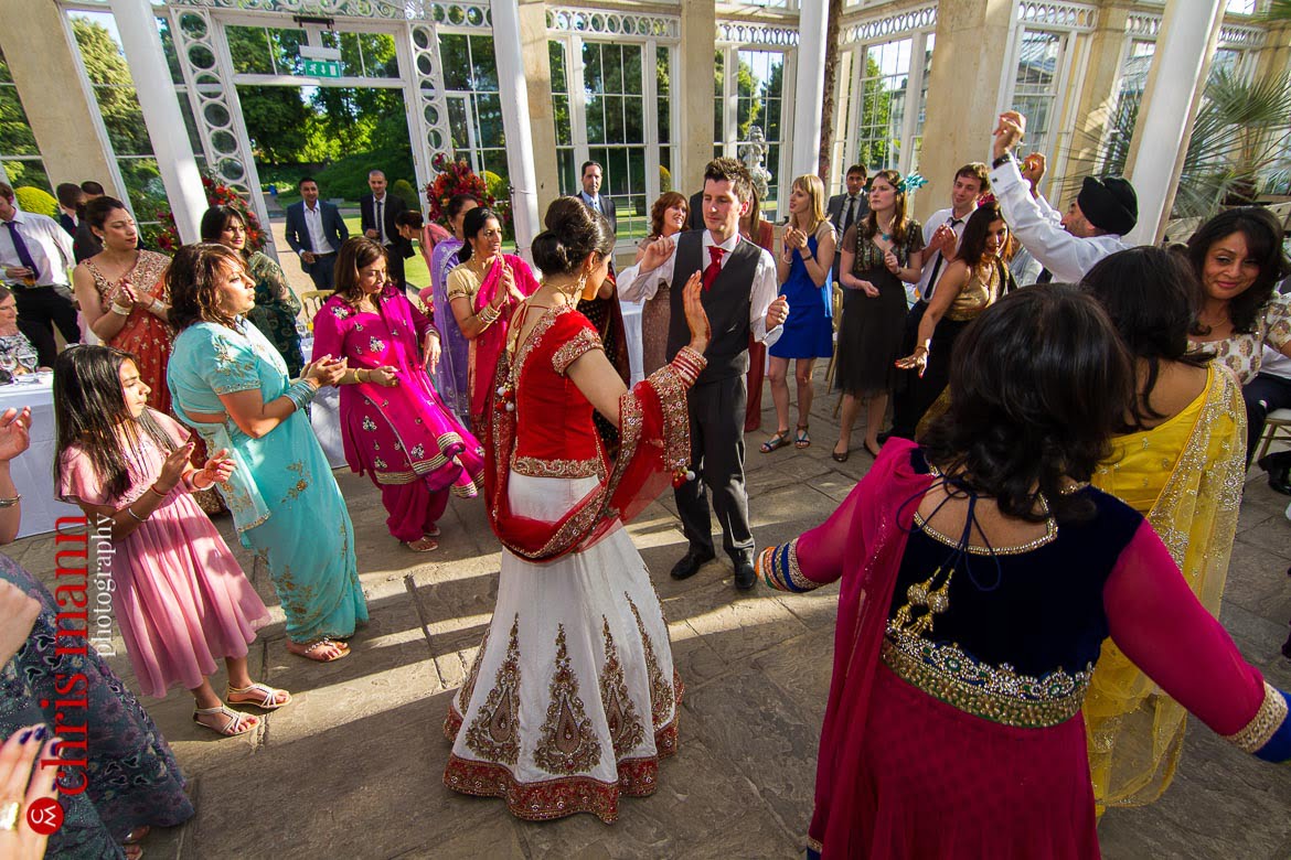 guests dancing at reception Syon Park Great Conservatory
