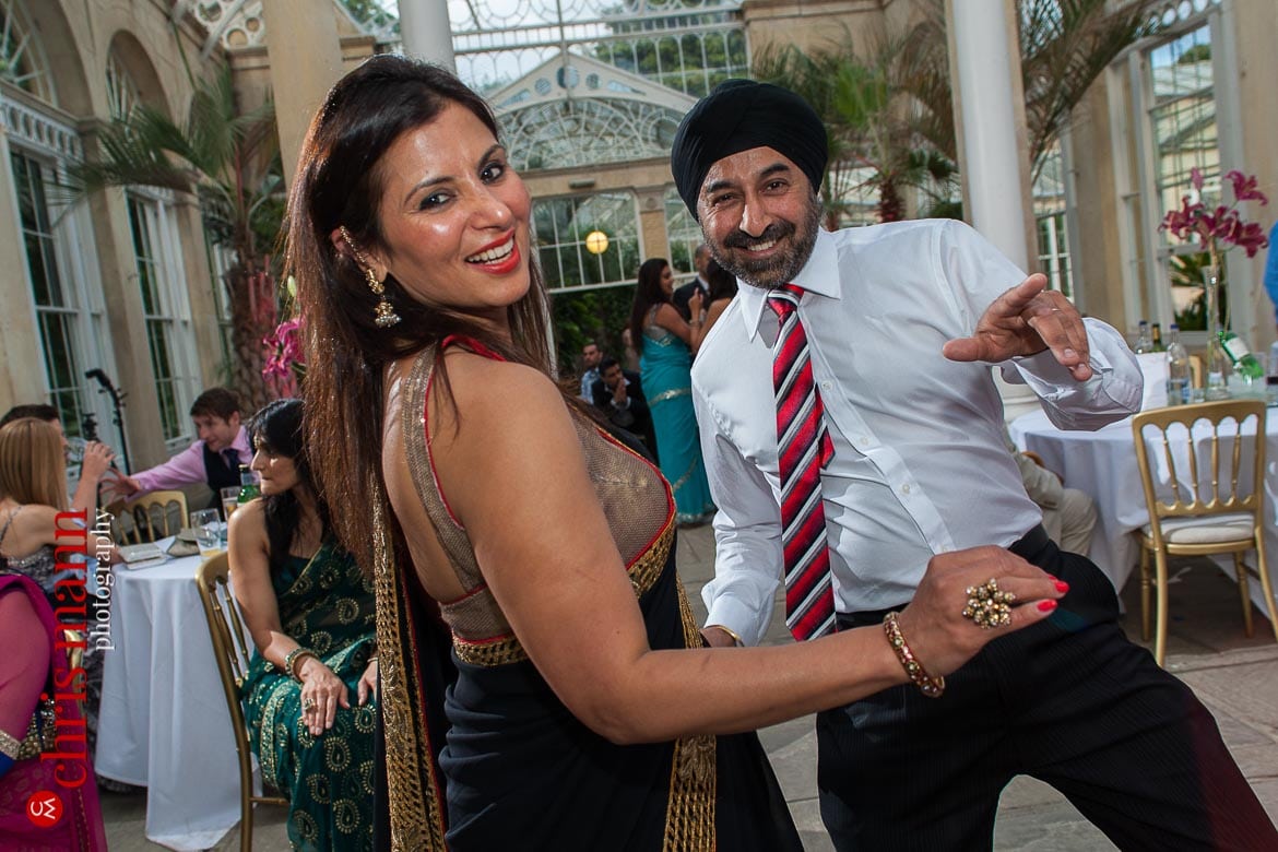 guests dancing at reception Syon Park Great Conservatory