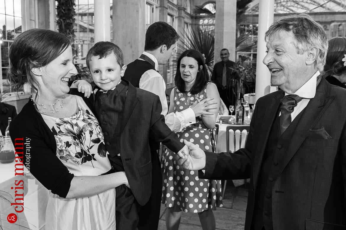 guests dance at evening reception Syon Park Great Conservatory