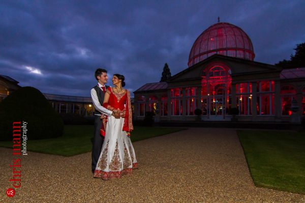 bride and groom outside at dusk Syon Park Great Conservatory