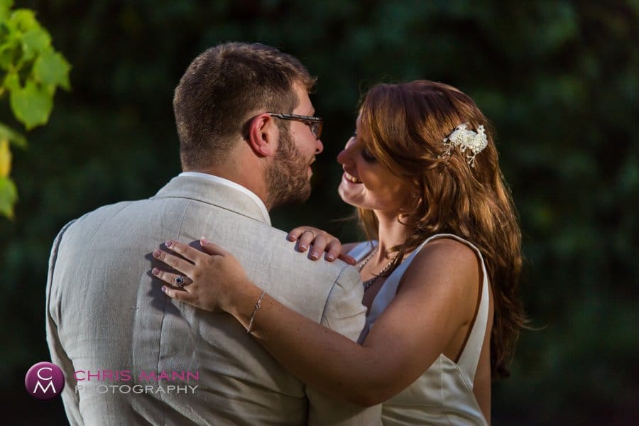 hugging bride and groom vines surrey
