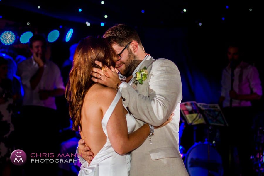 bride and groom kiss dancefloor wedding reception