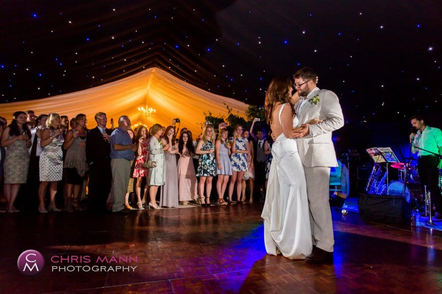 bride and groom first dance marquee wedding reception