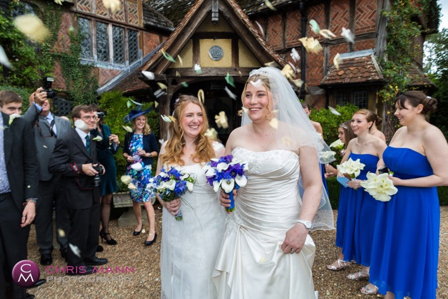 two brides civil partnership confetti toss langshott manor wedding