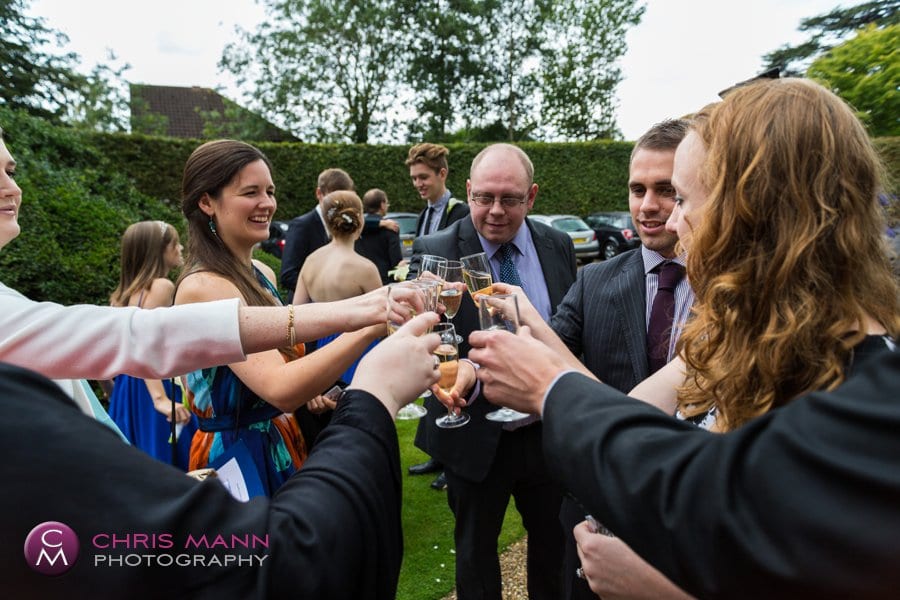 guests toasting the happy couple