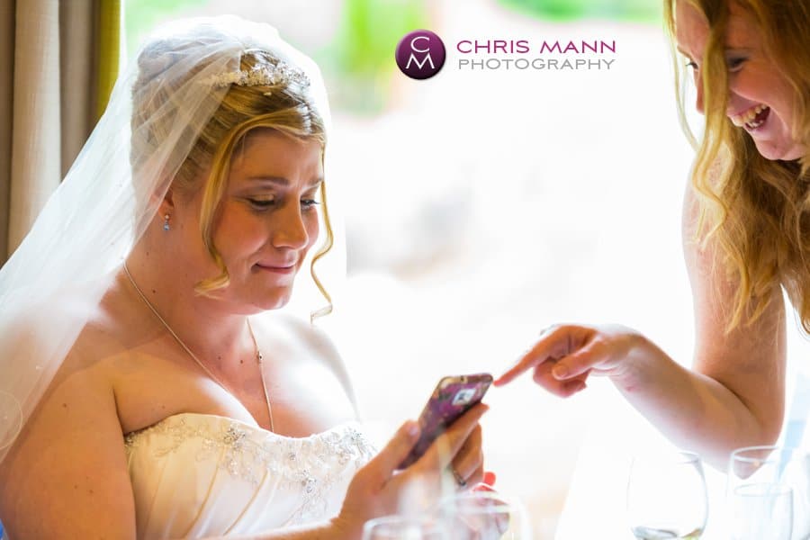 bride checks cellphone