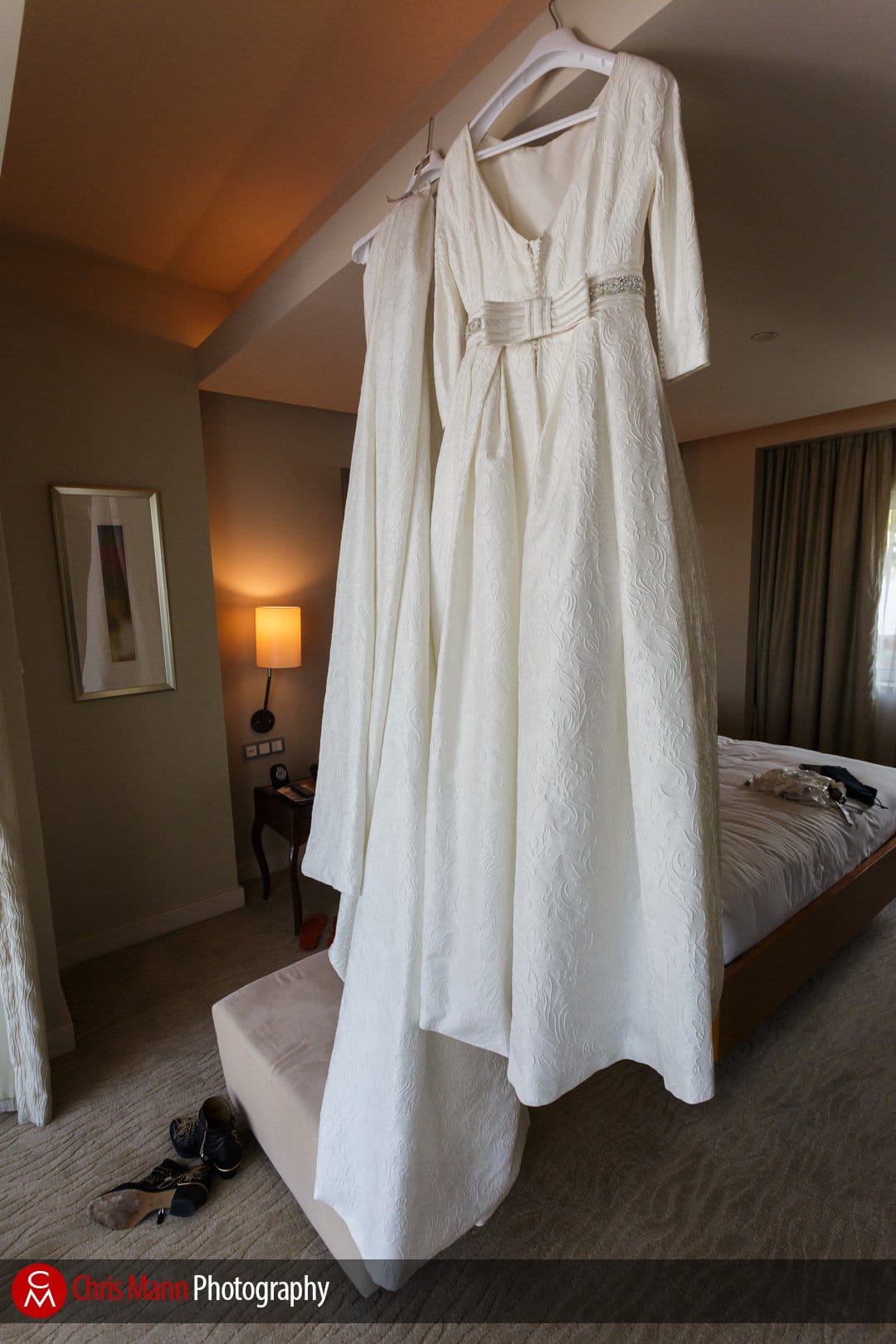 wedding dress hanging in room at Park Hyatt Dubai