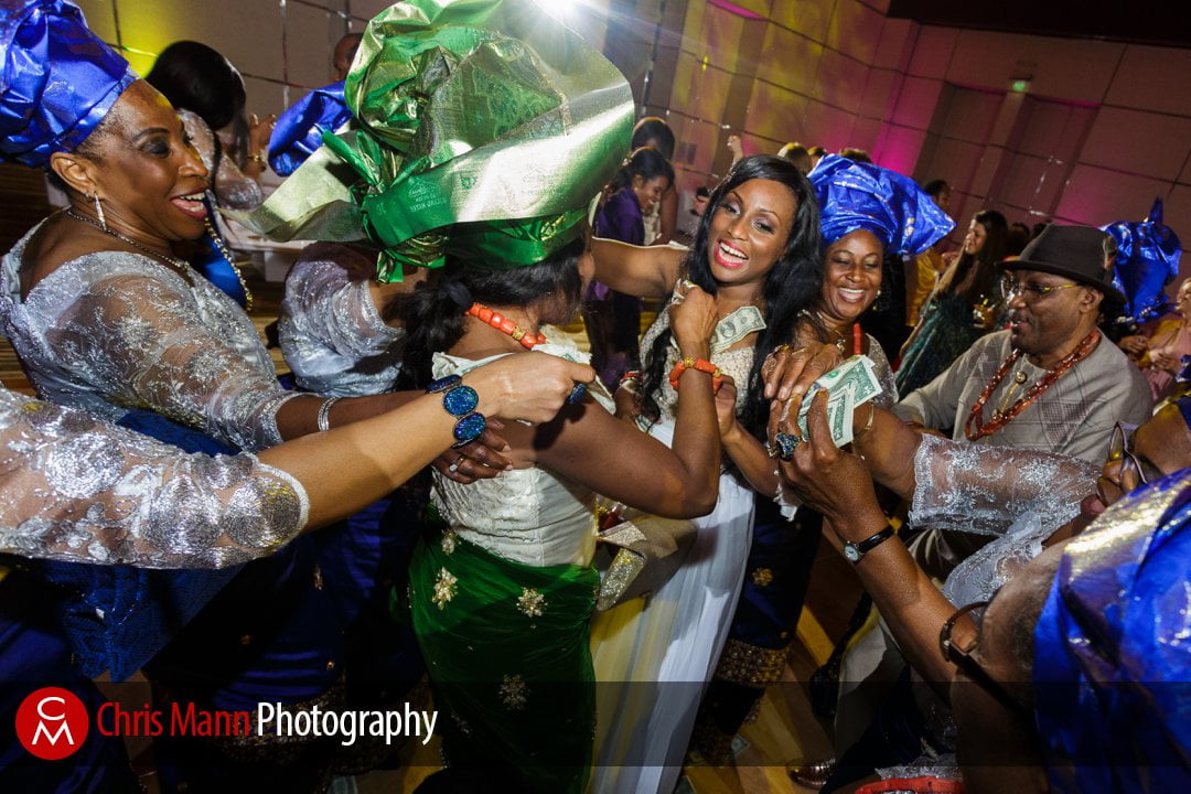 happy guests and family surround the bride on the dancefloor Park Hyatt Dubai