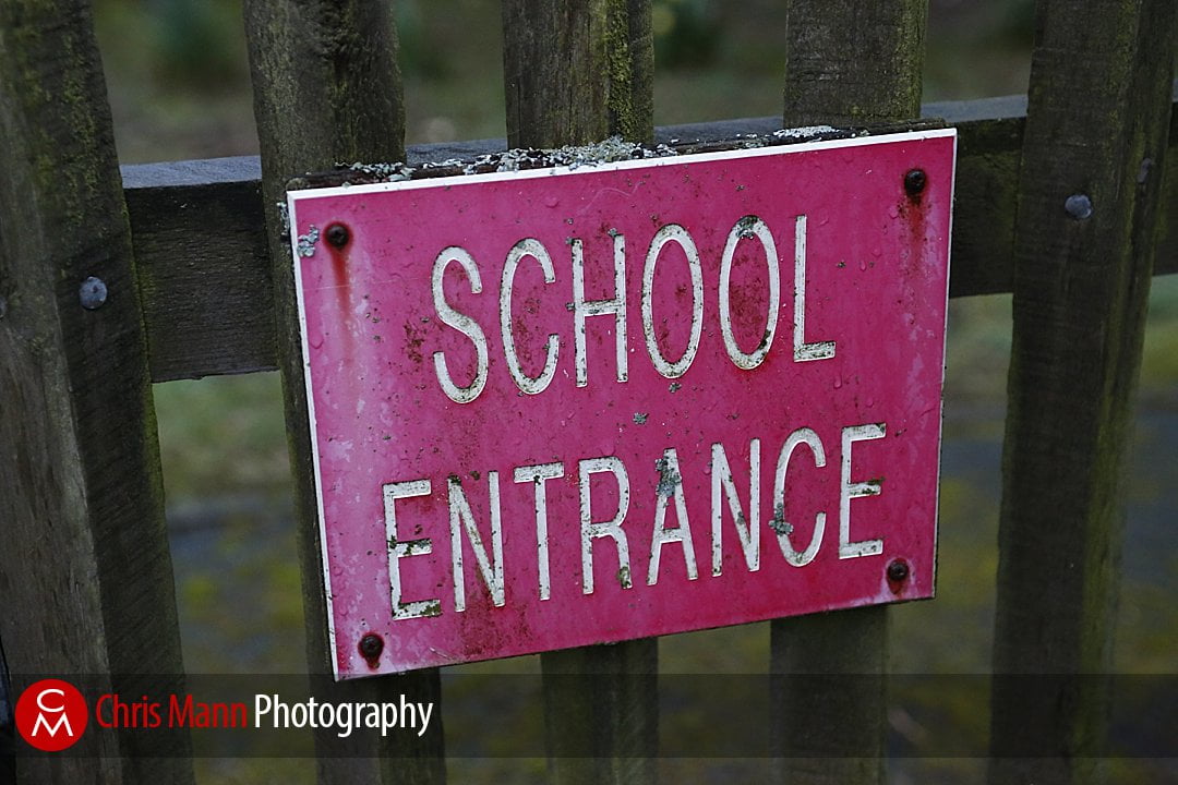 school entrance sign