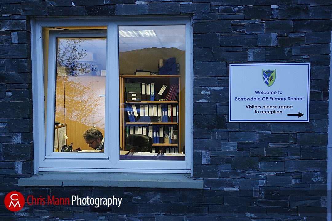 Photo Assignment: Primary School head teacher at work early morning