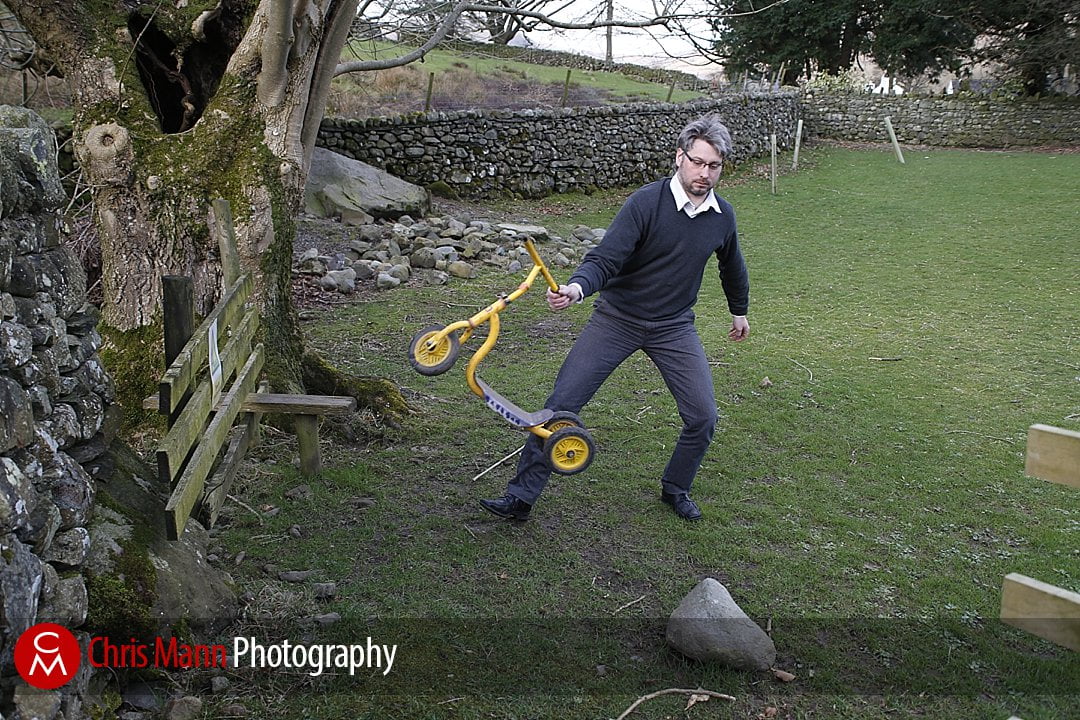 teacher tidying up the playground