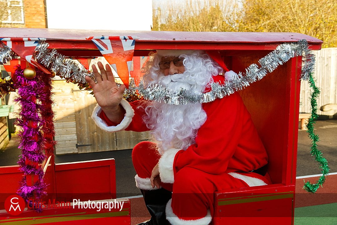 Santa waves form the train Wonersh & Shamley Green Primary School Christmas Fair photos
