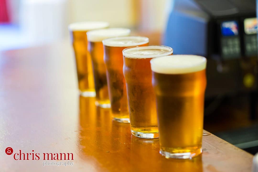 beer glasses on bar at wedding
