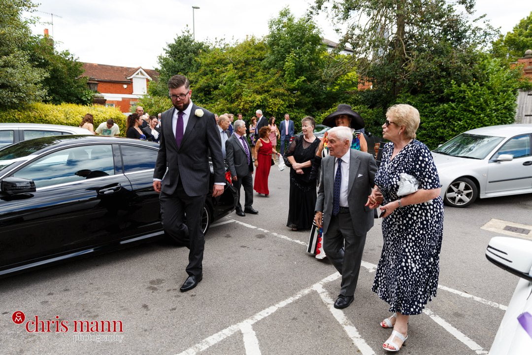 wedding guests arriving Leatherhead register office