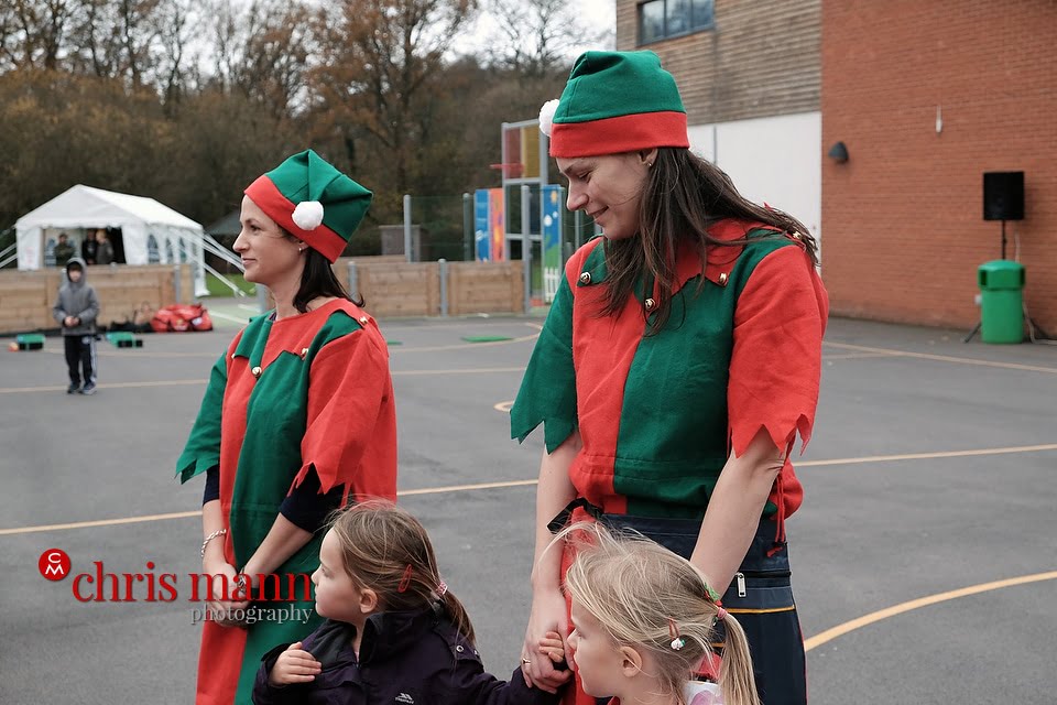 Santa's elves help to entertain children Wonersh and Shamley Green Primary School Xmas Fair 2015