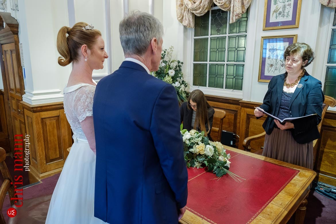 Registrar with bride and groom Oxford Register Office Wedding