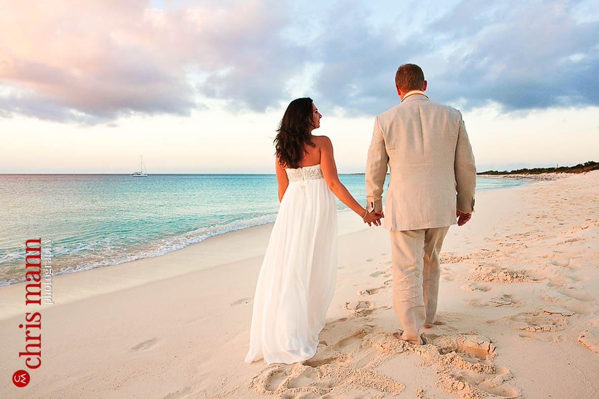 Turks & Caicos honeymoon shoot couple walking on Malcolm's Road beach Amanyara resort Providenciales