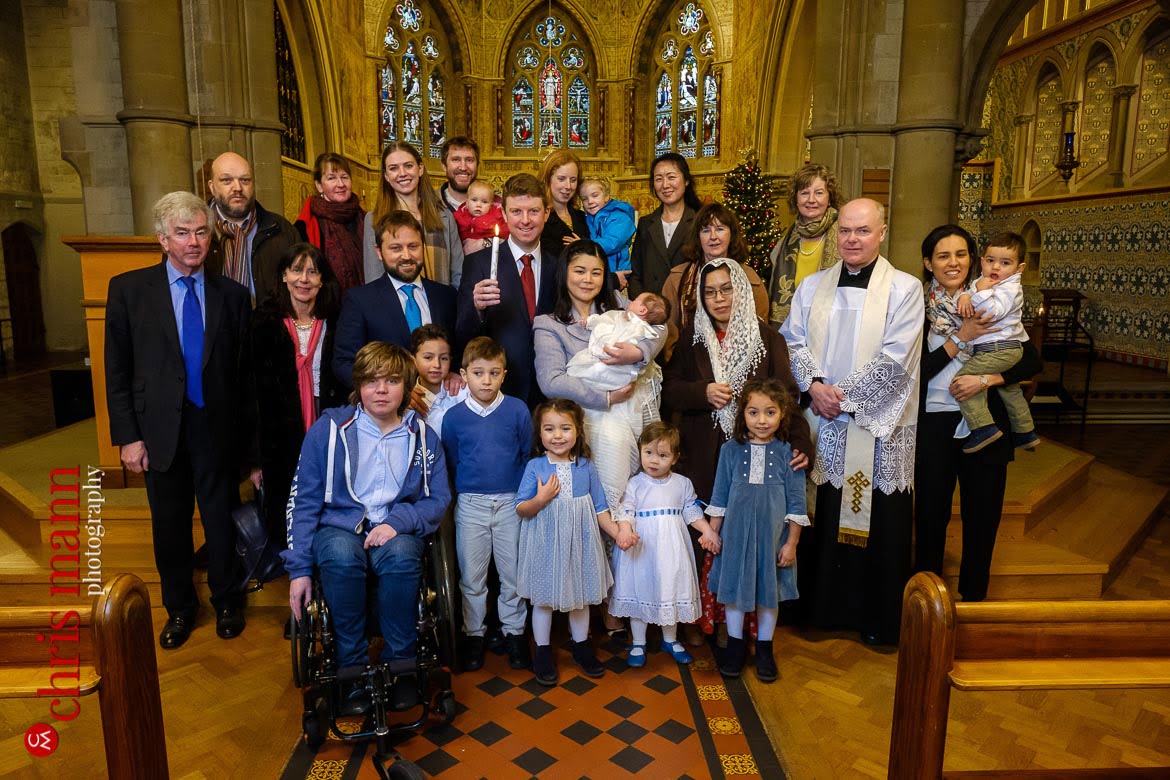 family group photo after christening ceremony at Sacred Heart Church Caterham